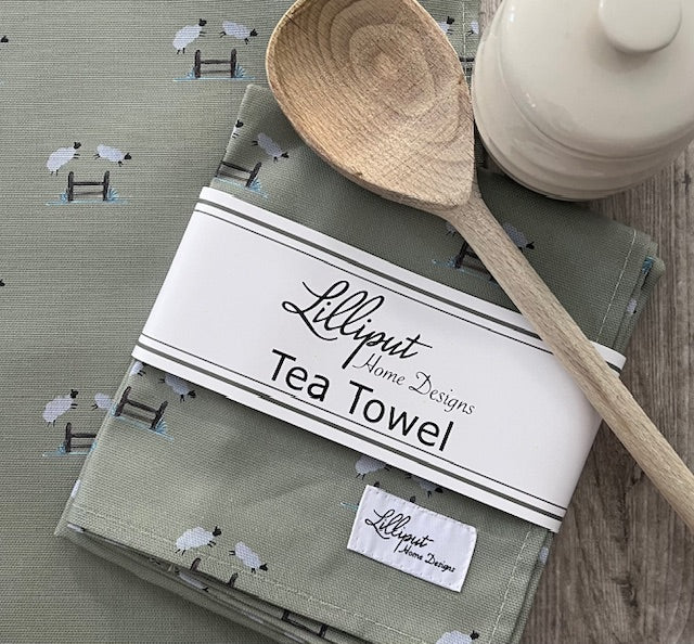 Jumping Sheep Tea towel - Sage background